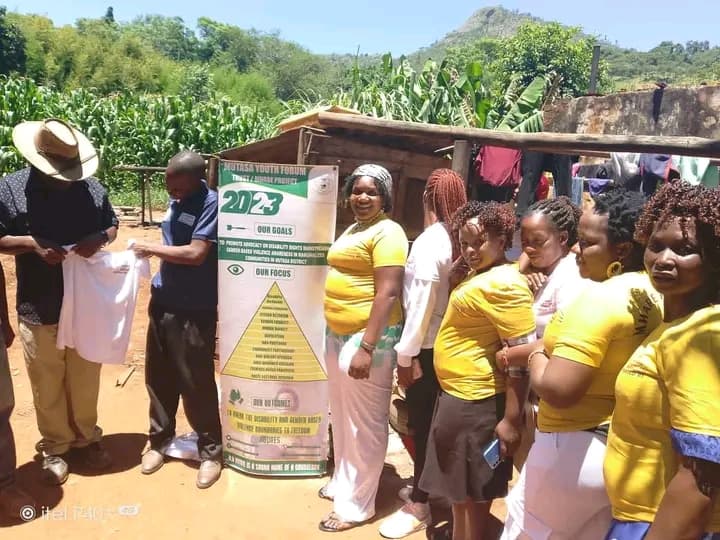 Mhare Project team with the 2023 community banner in Manicaland